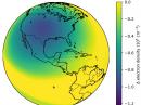 The difference in electron density, as modeled for August 21 at 1815 UTC, between the eclipsed and uneclipsed ionosphere at an altitude of 302 kilometers. A large electron density depletion caused by the eclipse shadow is visible over the US. [Courtesy of Joe Huba]